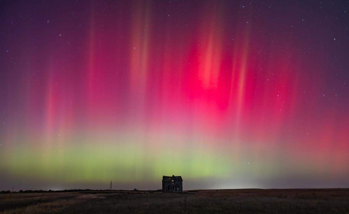 The northern lights can be seen above a dilapidated farmhouse near Marquette on Thursday night. The lights are caused by an interaction between the earth’s magnetic field and charged particles released by the sun.