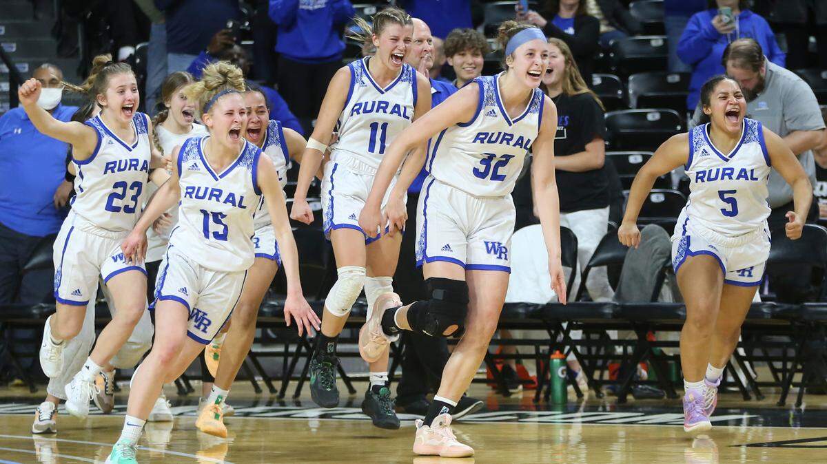 Washburn Rural players celebrate after the final buzzer during their 6A championship win over Derby on Saturday at Koch Arena.