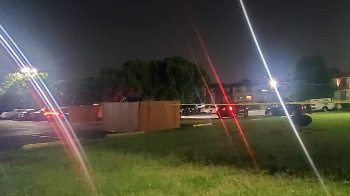 Police use crime scene tape to mark off an area in an apartment complex near Keeper of the Plains where a teenager died in a shooting Tuesday night.