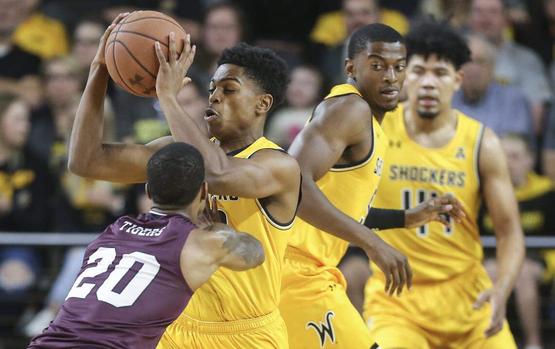Wichita State’s Grant Sherfield steals the ball from Texas Southern’s Tyrik Armstrong during the first half of their game at Koch Arena on Saturday.