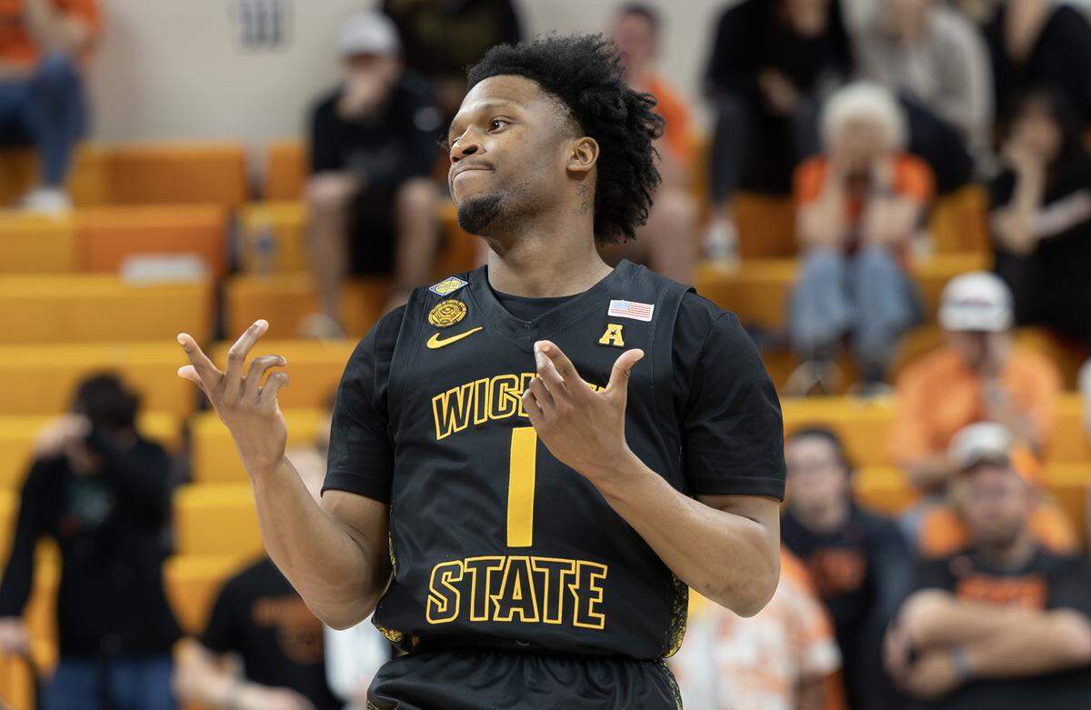 Wichita State’s Kenyon Giles celebrates one of his eight three pointers during the second half of their NIT second round game against Oklahoma State on Sunday night in Stillwater.