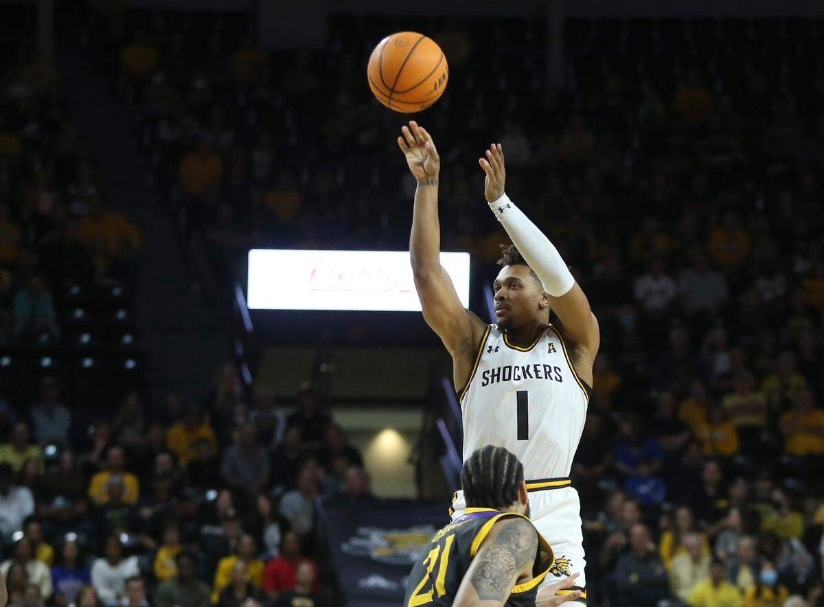 Tyson Etienne makes a three-pointer in the first half of Wichita State’s win over East Carolina on Saturday.