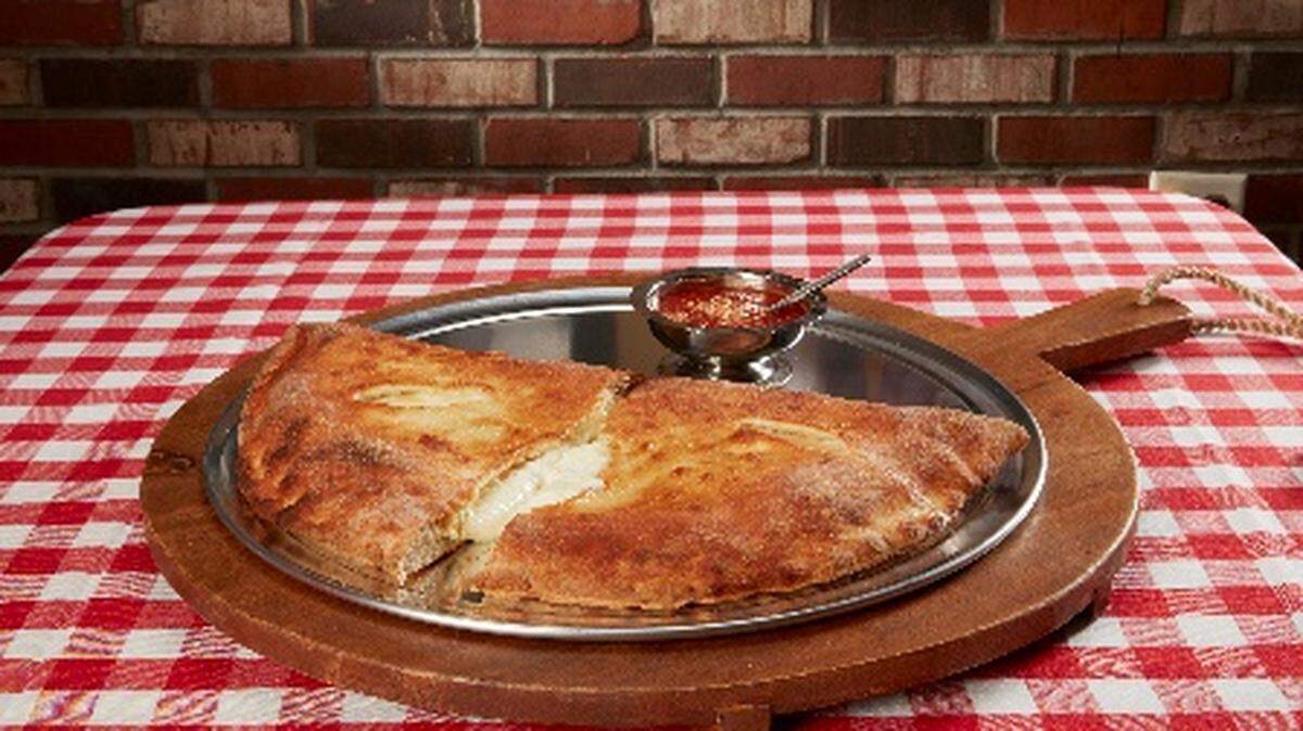 In addition to New York-style pizza, Grimaldi’s Pizzeria also serves calzones, salads and appetizers.