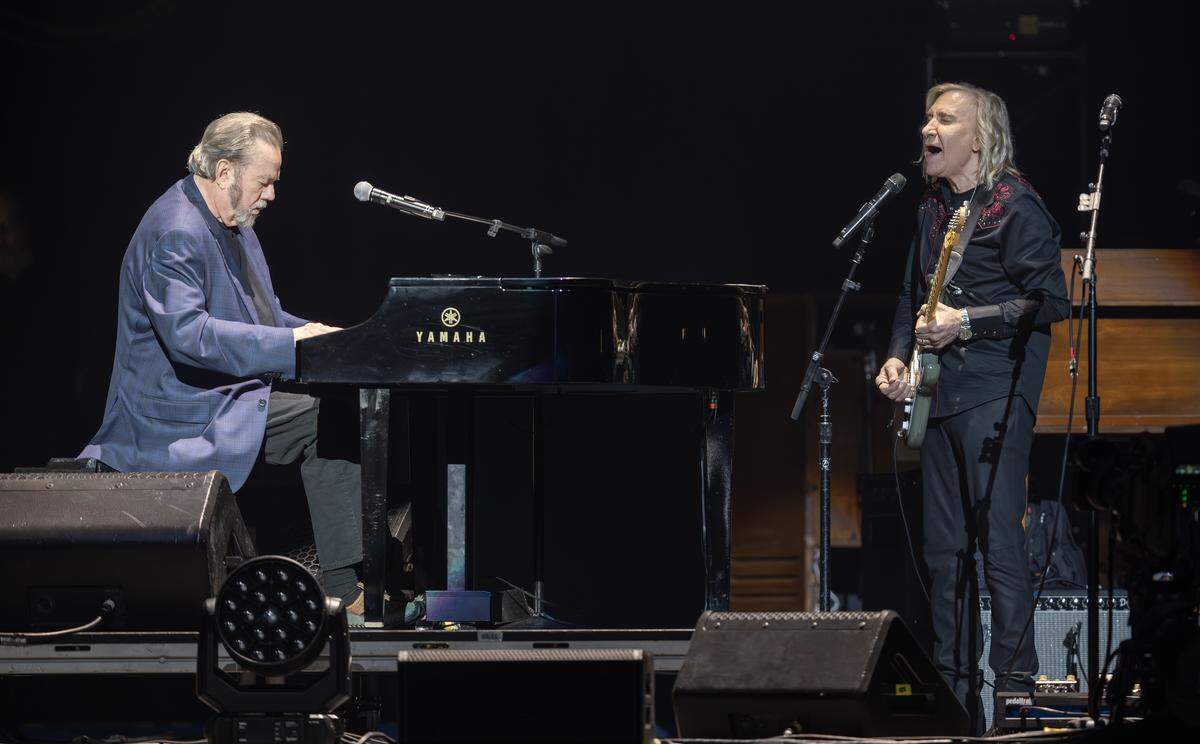 Joe Walsh performs the classic song “Wichita Lineman with the song’s creator, Jimmy Webb, at Walsh’s VetsAid concert at Intrust Bank Arena on Saturday night. The benefit concert raises money for local and regional veteran organizations.