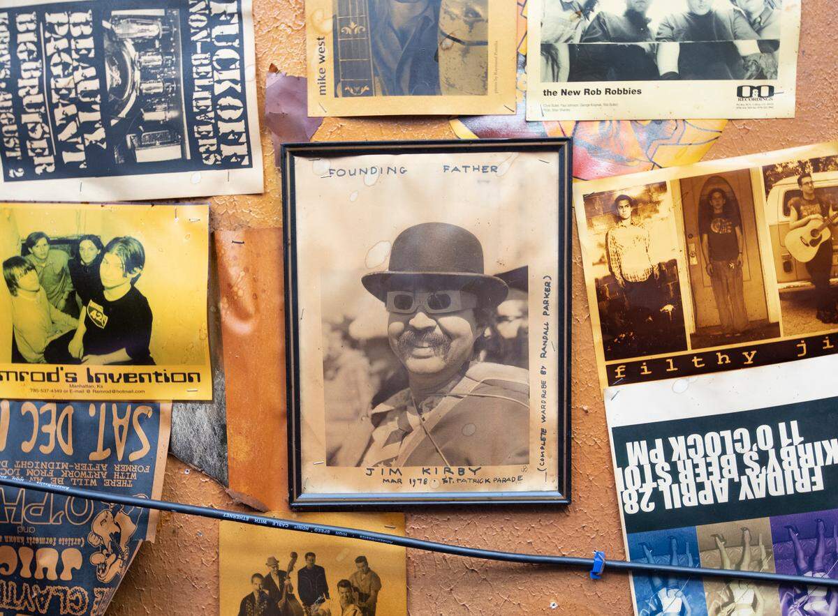 A photo of Jim Kirby hangs on the ceiling of Kirby’s Beer Store.