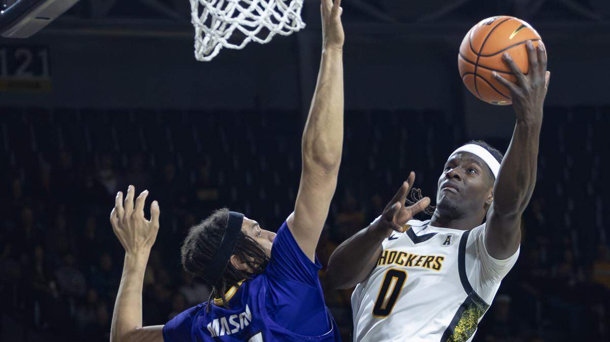 Wichita State’s Karon Boyd shoots over Prairie View A&M’s Keeshawn Mason during the first half on Saturday at Koch Arena.