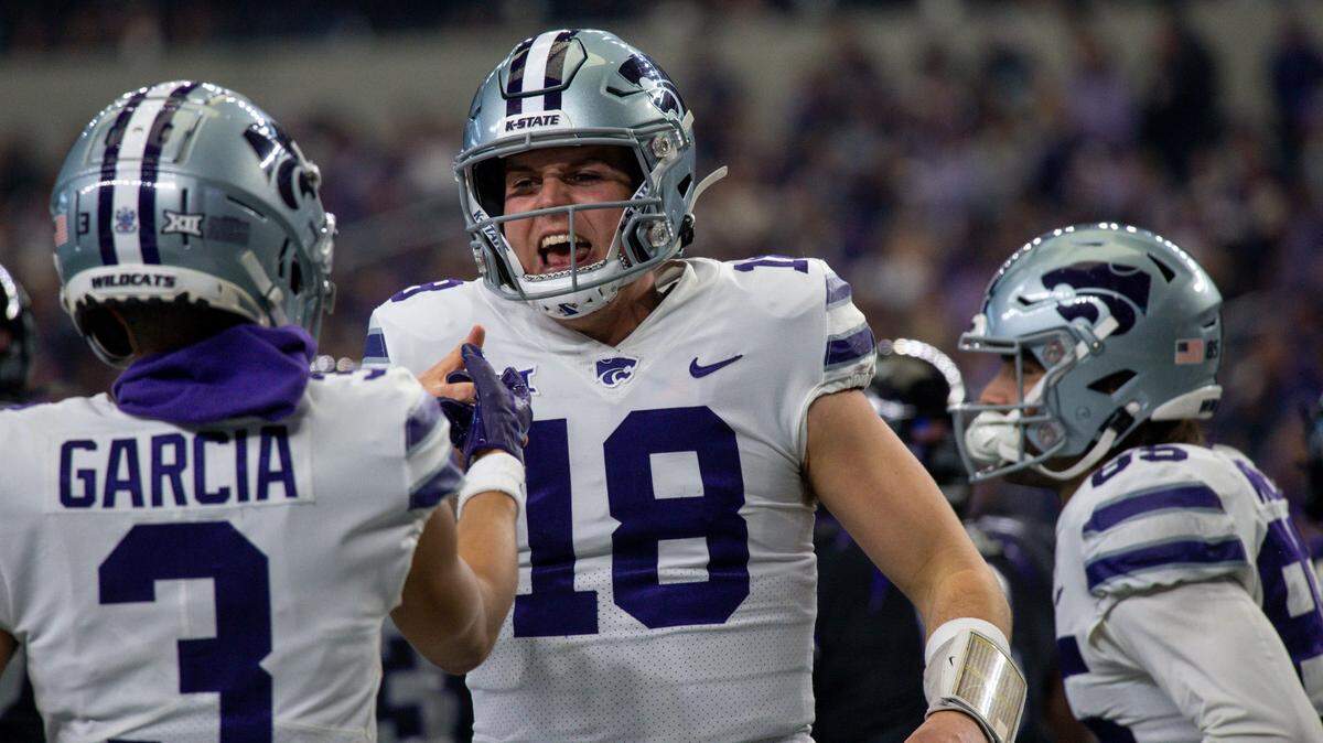 Kansas State Wildcats wide receiver RJ Garcia II (3) and quarterback Will Howard (18) celebrate a touchdown against the TCU Horned Frogs during the second quarter at AT&T Stadium on Dec. 3, 2022.