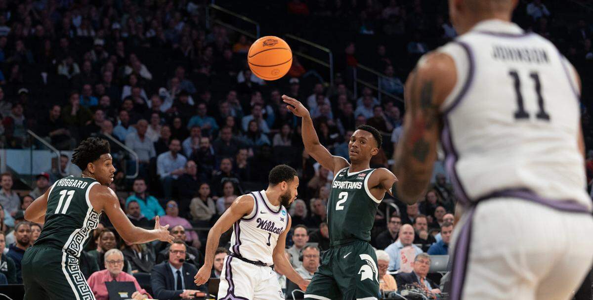 Kansas State’s Markquis Nowell makes a no-look pass to teammate Keyontae Johnson during the first half of their east region semifinal game against Michigan State at Madison Square Garden on Thursday night.
