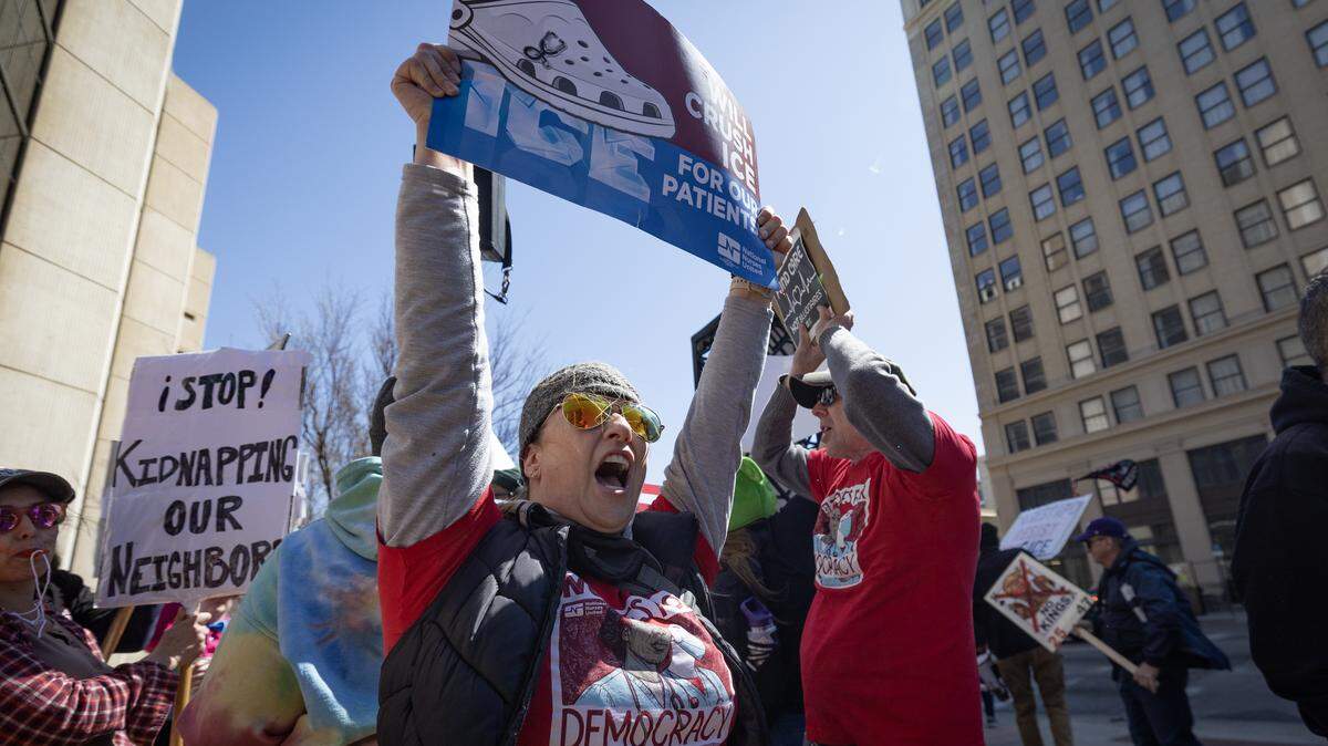 Hillary Kreutzer yells while attending the “No Kings” protest in downtown Wichita Saturday afternoon.