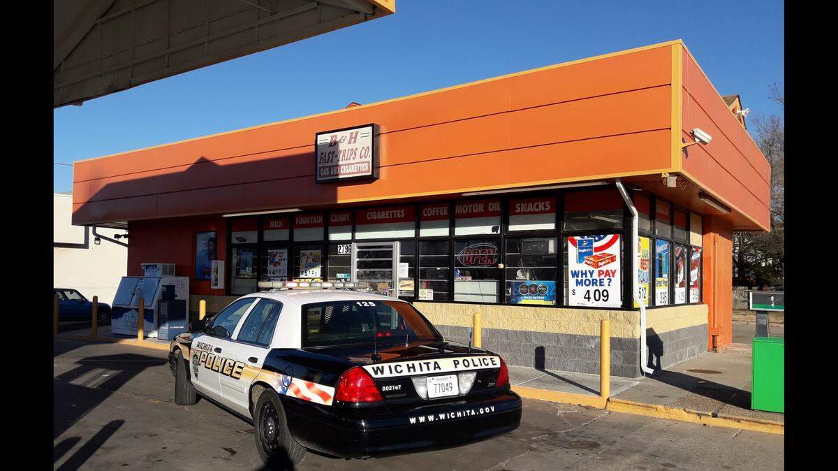Twenty-four hours after a customer shot a 16-year-old armed robbery suspect at B and H Fast Trips in south Wichita, police were still investigating the crime scene.