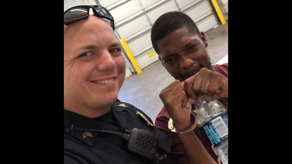 Galena Police Sgt. Blaine Cornelius and Tyrone Amos had a Facebook feud after Amos allegedly fled after a traffic stop. Amos turned himself in, and brought along a box of doughnuts.