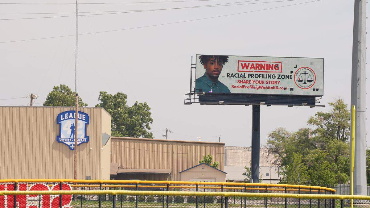 The Racial Profiling Advisory Board paid for this billboard by I-135 and 17th. It says “Warning Racial Profiling Zone” and aims to help increase reporting of police racial profiling in Wichita.