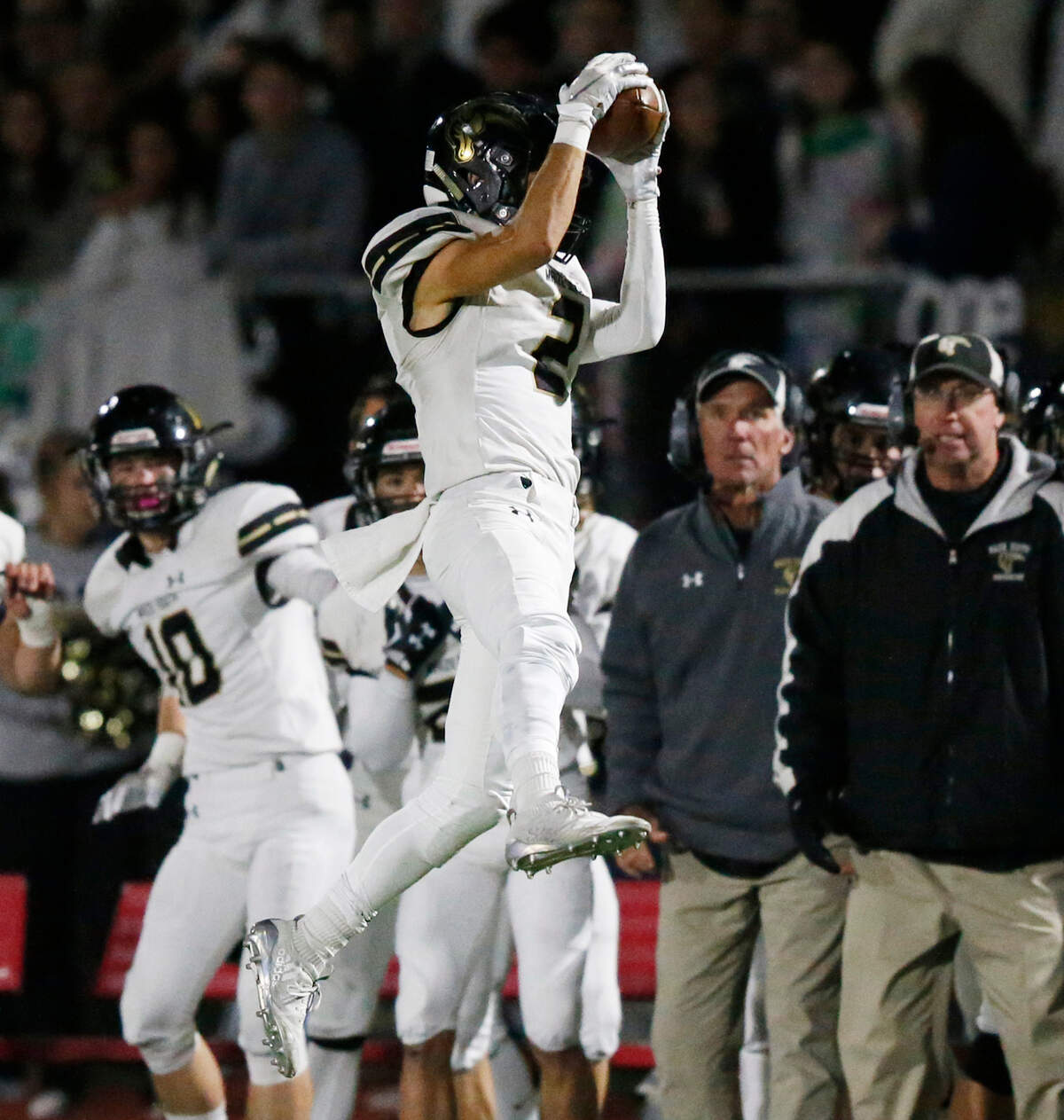 Maize South #2 Corey Minks grabs a pass from quarterback Colin Shields  late in the first half against Maize. (November 2, 2018)