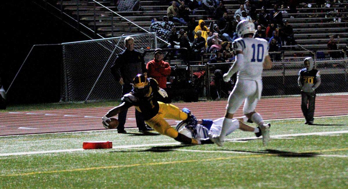 Breece Hall reaches for the pylon in Wichita Northwest’s 55-26 win over Kapaun on Friday. (Sept. 28, 2018)