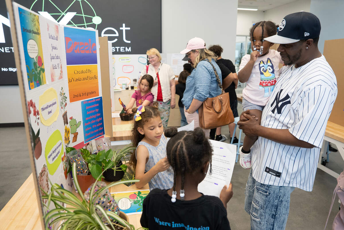 Jazelle Henry and Ja’Vasia Spires present their invention, The Drizzle Dazzle, during the Inventive Showcase at Creative Minds.