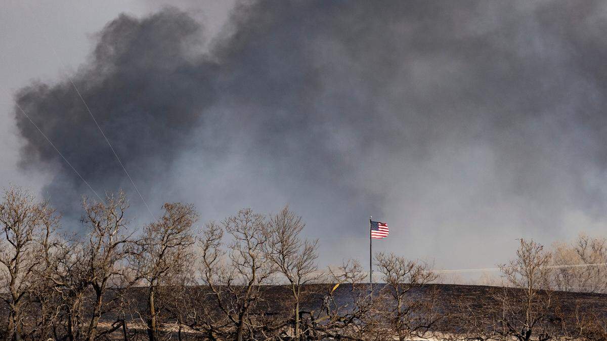 High and shifting winds caused a huge wildfire in eastern Reno County on Saturday. The fire also moved into Harvey County.