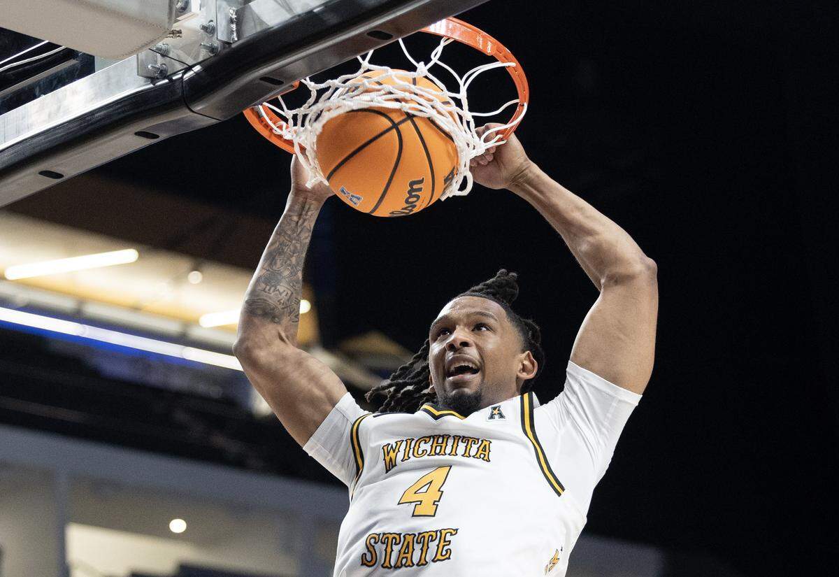 Wichita State TJ Williams dunks the ball during the second half of the Shockers’ AAC tournament semifinal game against Tulsa on Saturday in Birmingham.