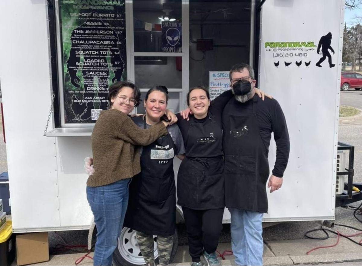 The Paranormal Eggsperience food trailer will sell food items outside the new Paranormal Cafe Mondays through Fridays. Pictured here are co-owners Brian Armitage, far right, and Grace Doukali, second from left. Also pictured are Doukali’s daughters, who work for the trailer: Ranya, far left, and Maryam, second from right.