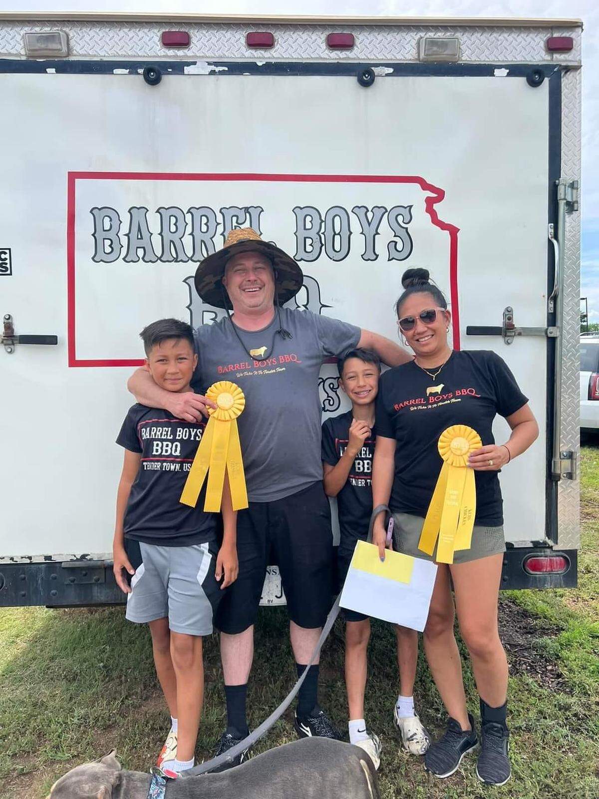 Buddy King’s family — wife Joana, right, and sons Rainen and Chase — often travel with him on the barbecue competition circuit.