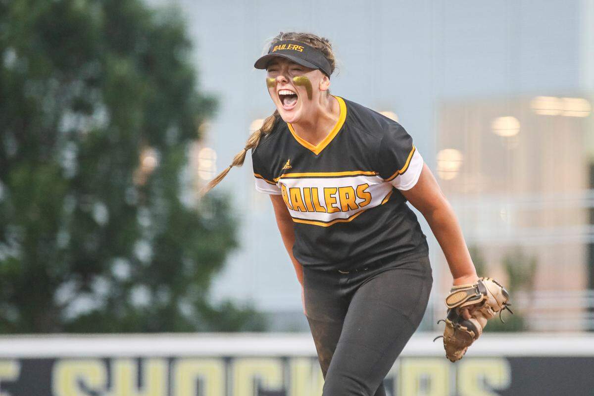 Newton junior Tegan Livesay cheers after winning against Overland Park Blue Valley Southwest in the 5A quarterfinals on Friday, May 27, 2022.