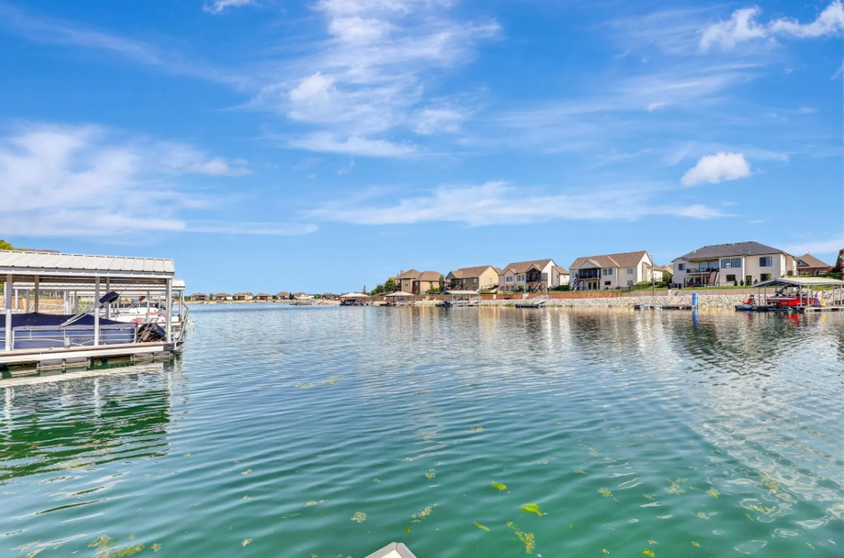 The back view from 2612 N. Paradise Court, a waterfront Wichita property listed for $1 million.