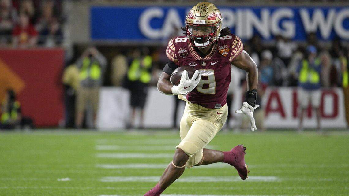 Florida State running back Treshaun Ward (8) rushes during the second half of the Cheez-It Bowl NCAA college football game against Oklahoma, Thursday, Dec. 29, 2022, in Orlando, Fla.