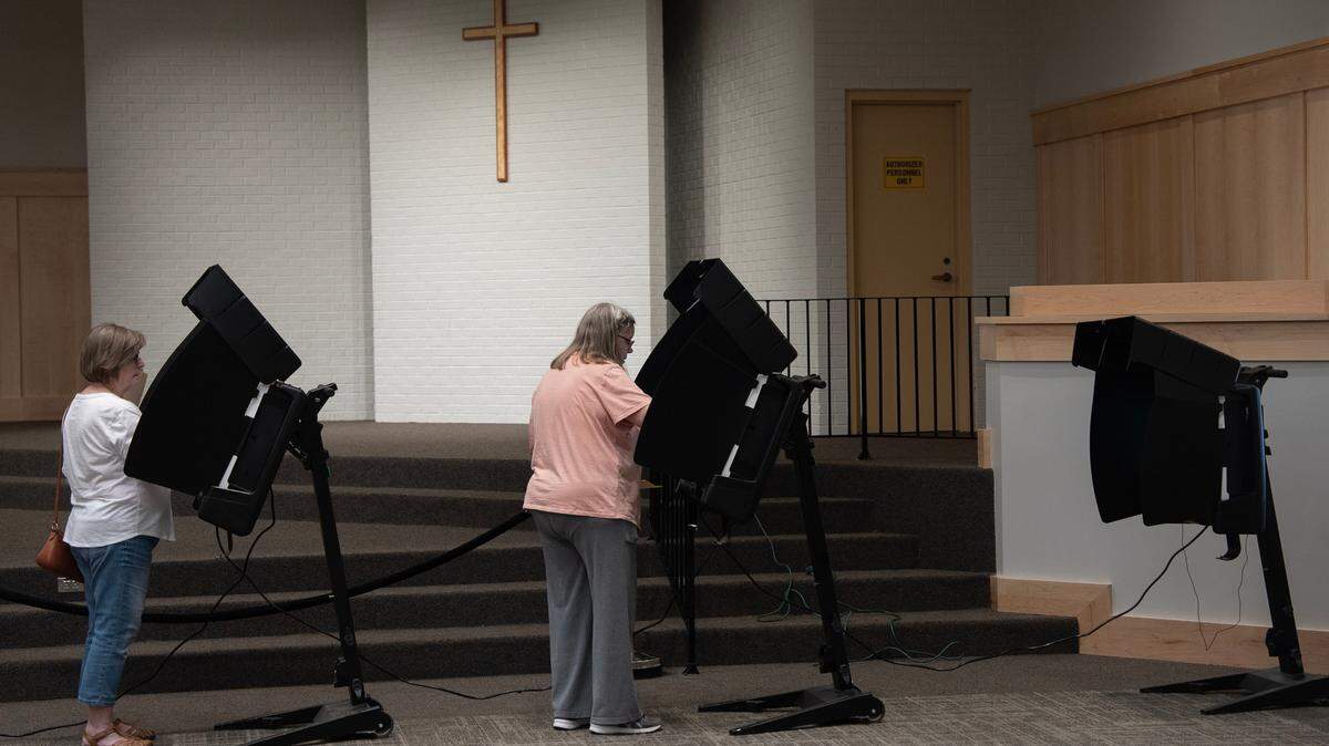Voters cast ballots in the primary election in 2024.