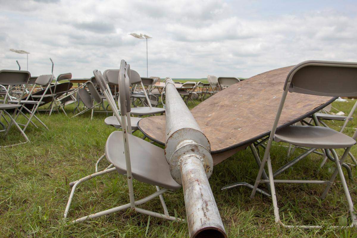 A pole crushed a table at the planned site of Symphony in the Flint Hills. Extreme weather caused this year’s signature event to be canceled (Photo courtesy of Daniel Caudill, Flint Hills Media Project).