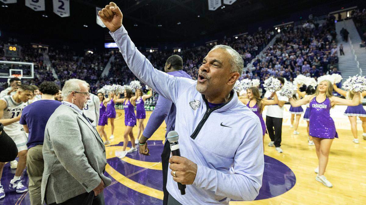 K-State coach Jerome Tang celebrates with fans after the Wildcats beat Oklahoma 85-69 in Manhattan.