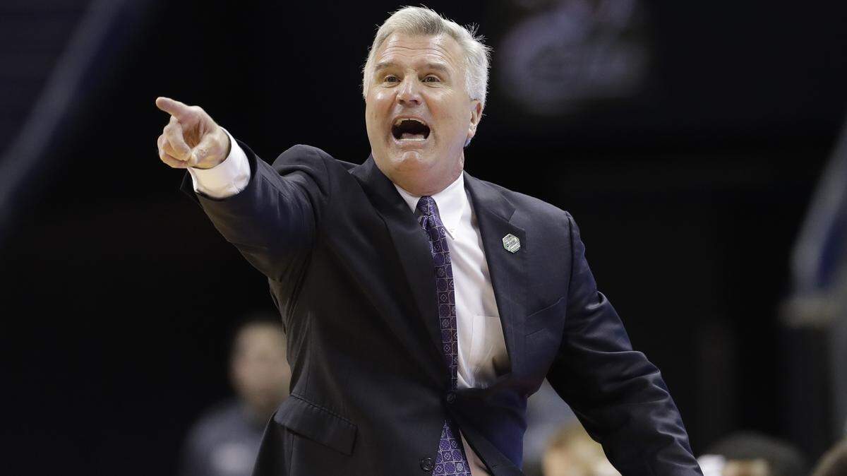 Kansas State head coach Bruce Weber argues a call during the first half of a second-round game against UMBC in the NCAA men's college basketball tournament in Charlotte, N.C., Sunday, March 18, 2018. (AP Photo/Gerry Broome)