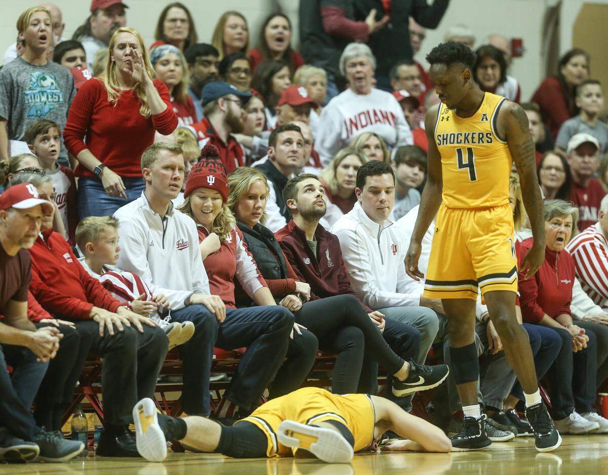 Indiana fans look at an injured Erik Stevenson during the first half of their NIT quarterfinal game at Assembly Hall in Bloomington, Indiana on Tuesday.