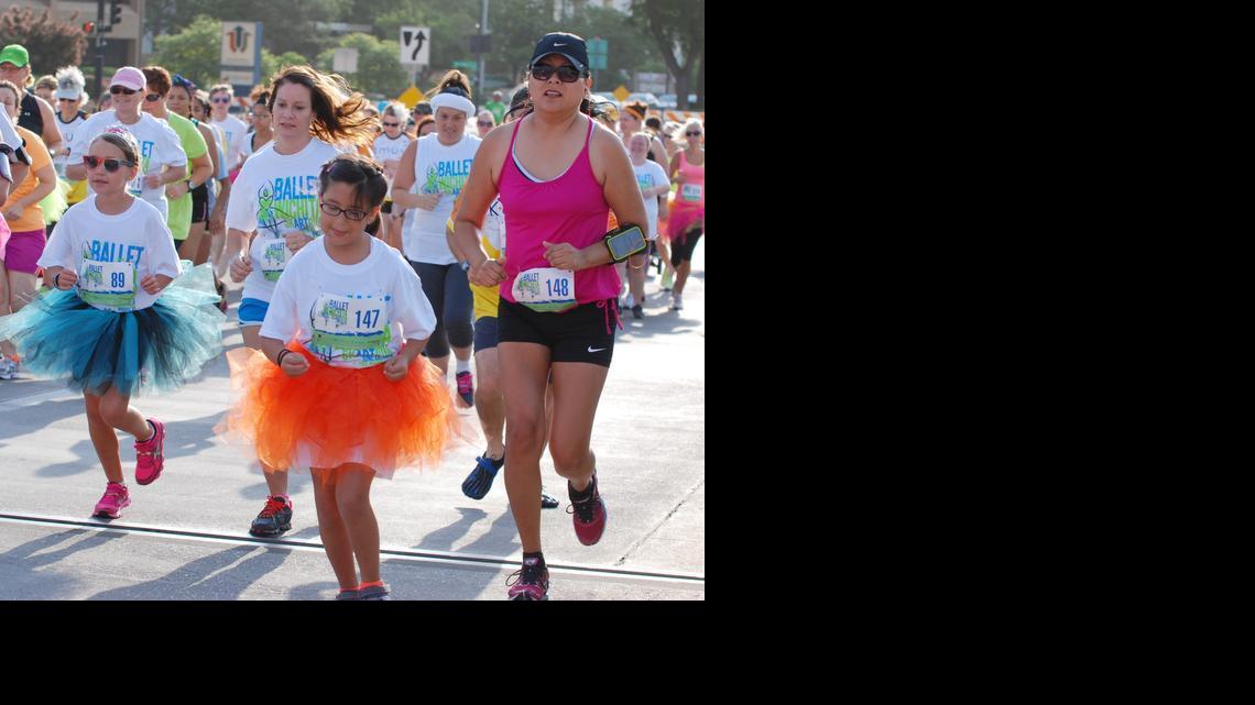 Racers participate in the Ballet Wichita 5K run in 2013 at A. Price Woodard Park.

