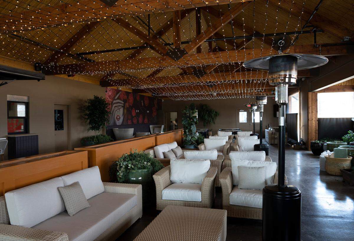 Doma, which opens on Tuesday, includes a large indoor/outdoor lounge with comfortable seating.