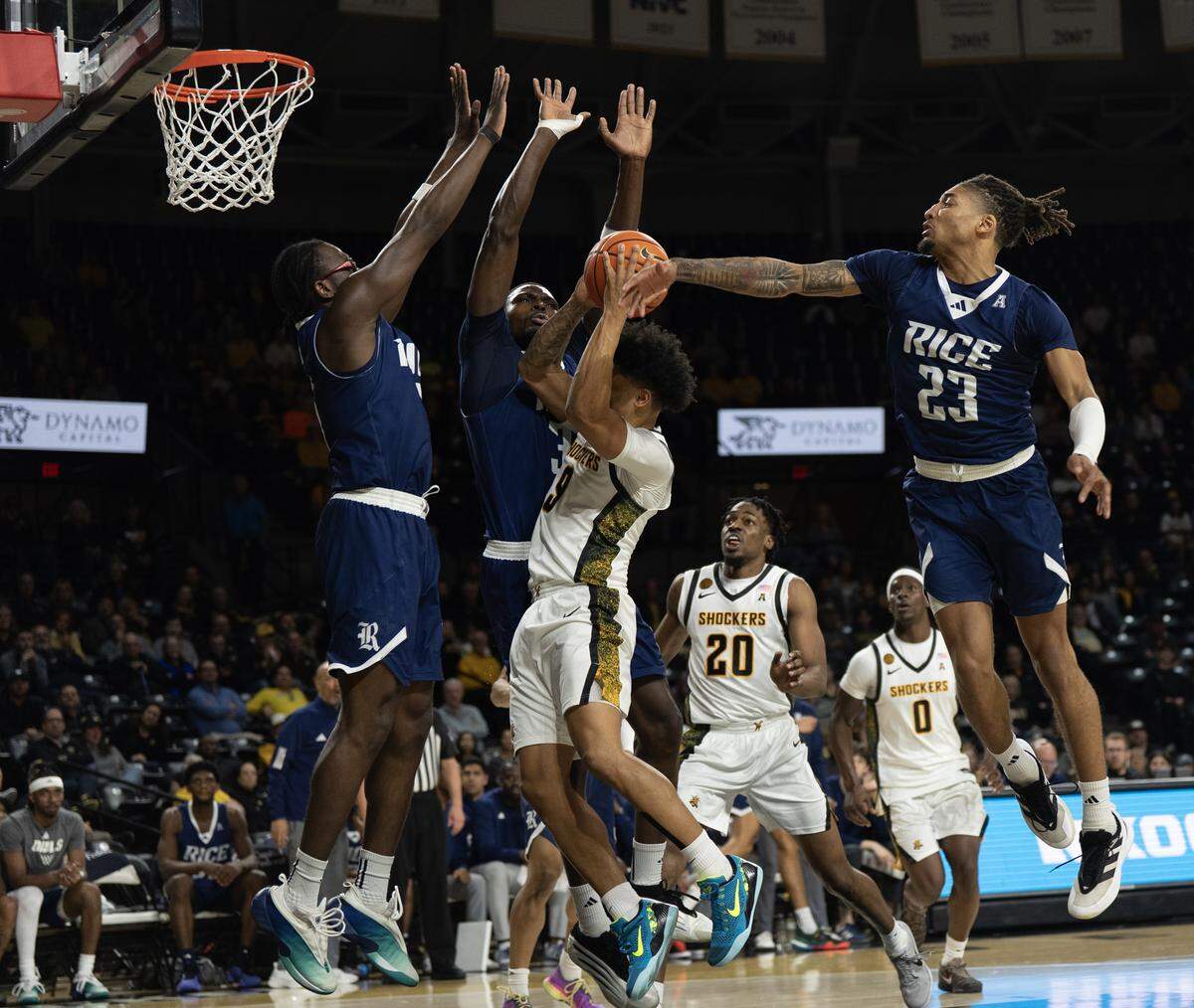 Wichita State’s Michael Gray shoots the ball surrounded by Rice players.