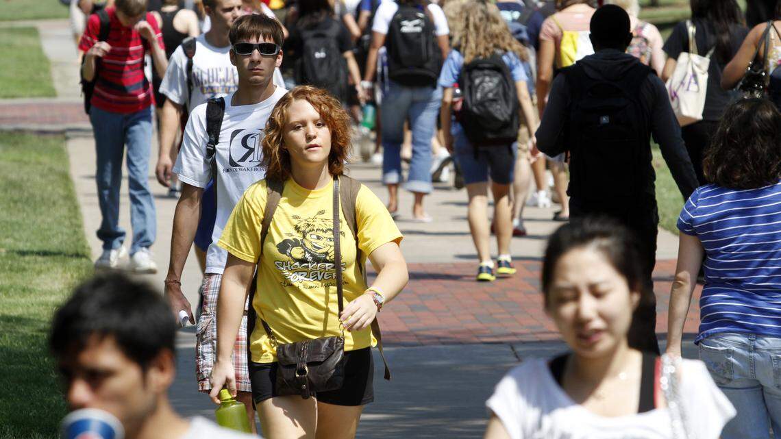 The walkway near the Rhatigan Student Center at Wichita State University is packed with students during the first week of school in 2011.