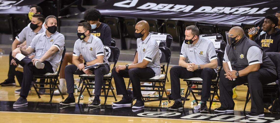 The Wichita State men’s basketball coaching staff featuring from left to right: Jeff Chapman (video coordinator), Lou Gudino (assistant), Nick Jones (player development), Isaac Brown (head coach), Billy Kennedy (assistant) and Tyson Waterman (assistant)