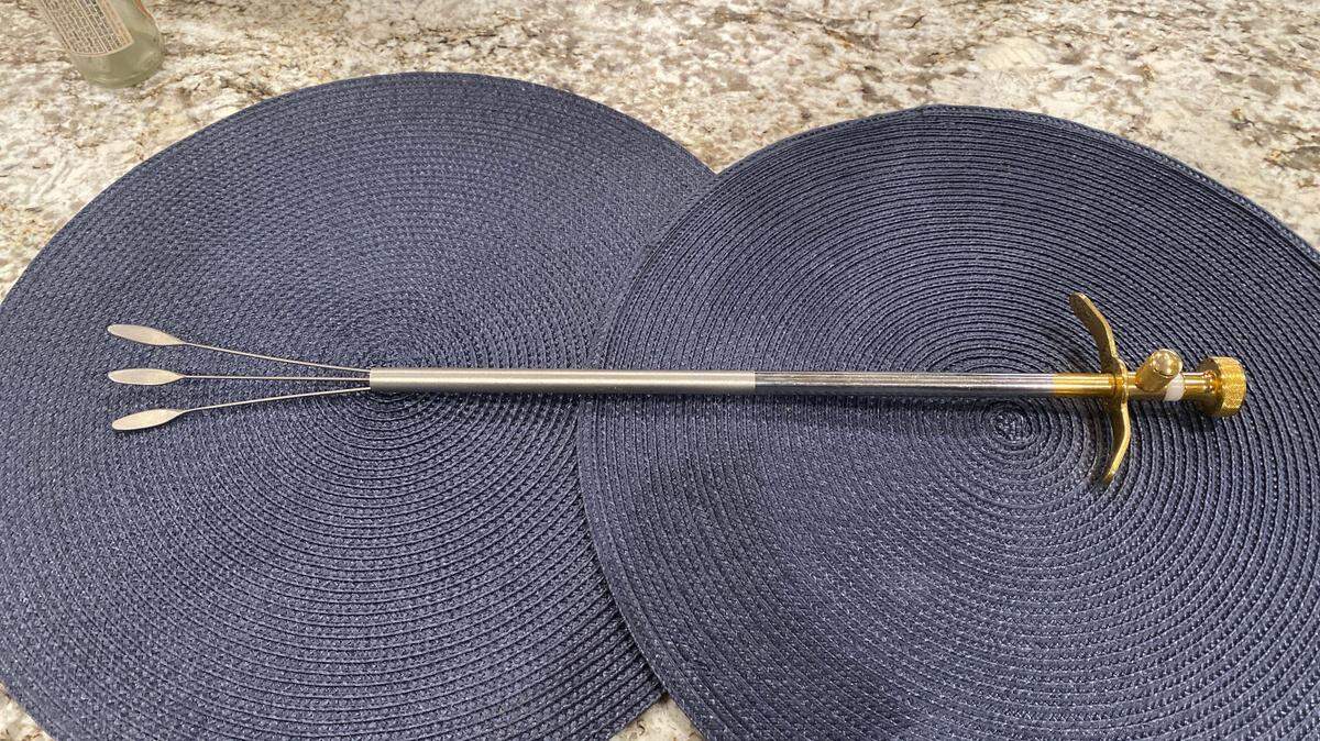 Retired physician Paul B. Harrison is loaning this early model of a laparoscopic liver retractor to the Ulrich Museum for the “Getting Personal” exhibition, which will feature items from the local community.