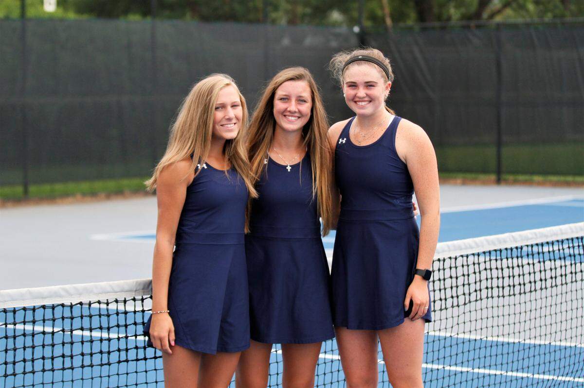 Kapaun’s Reagan Boleski (left), Claudia Fury (center) and Clara Whitaker (right) are poised for an outstanding 2019 girls tennis season.