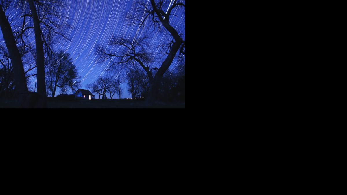 Star trails paint the night sky above the “Home on the Range” cabin in this composite photo made up of more than 500 individual photos. (May 2, 2014)

