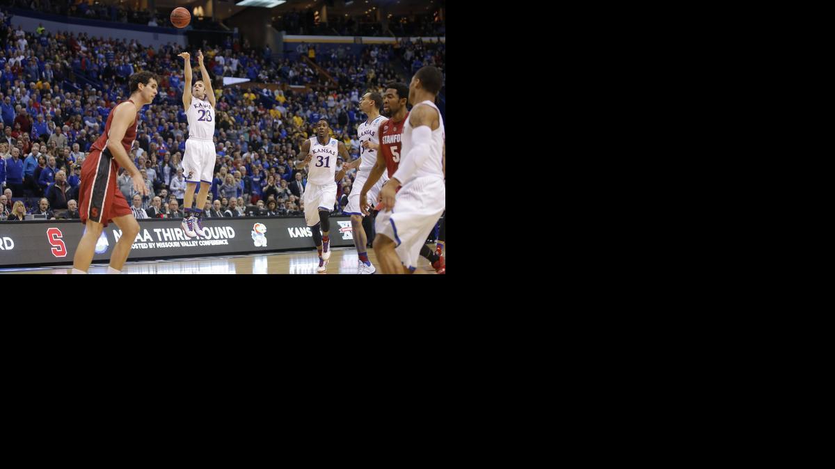 Kansas' Connor Frankamp hits a three-point shot that gave KU a 24-22 lead over Stanford at the end of the first half Sunday in St. Louis. Frankamp made two more three-pointers in the final minute of the game to give KU a chance to win, then missed a three at the buzzer that would have sent the game to overtime. 

