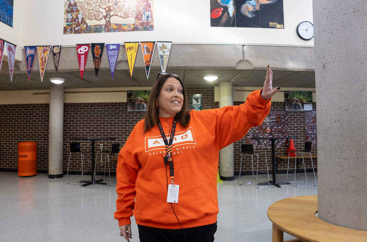 Coleman Middle School Principal Karen Waterman-Overgaard points out the dome buildings on the campus at 1544 N. Governeour.