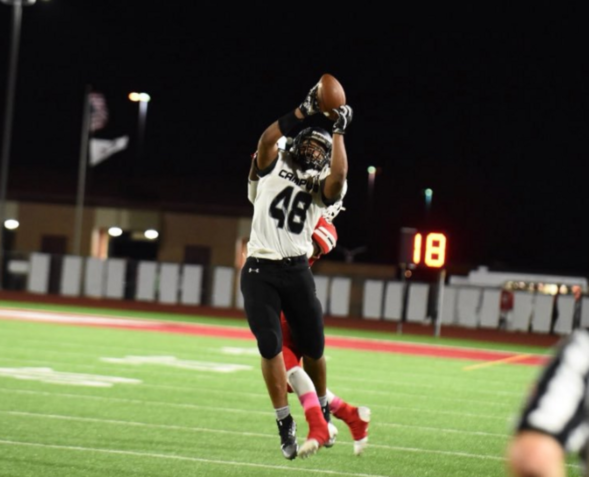 Campus’ Quinton Hicks intercepts a ball.