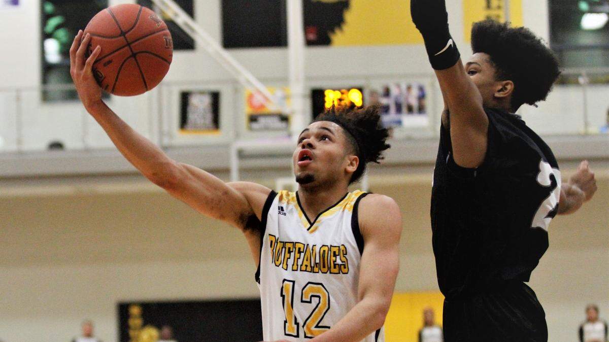 Wichita Southeast’s Johnny Murdock and Campus’ Shawn Warrior