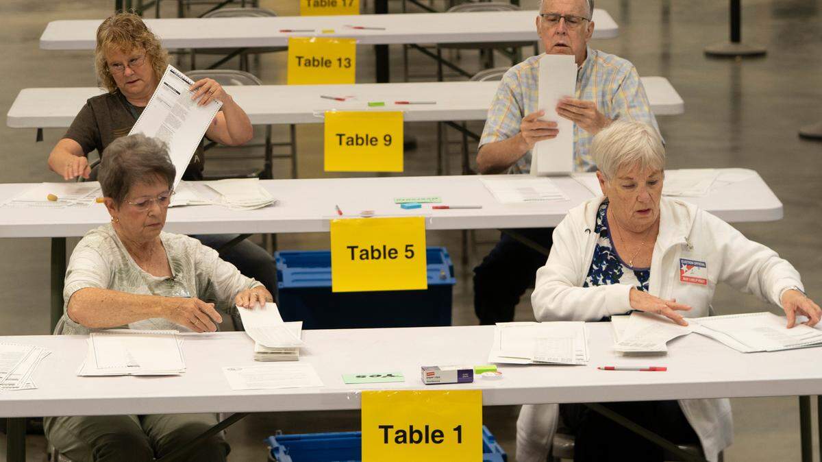 Bipartisan counting teams prepare to recount nearly 150,000 ballots at the Sedgwick County Extension Center on a constitutional amendment that would’ve removed abortion rights from the Kansas Constitution.