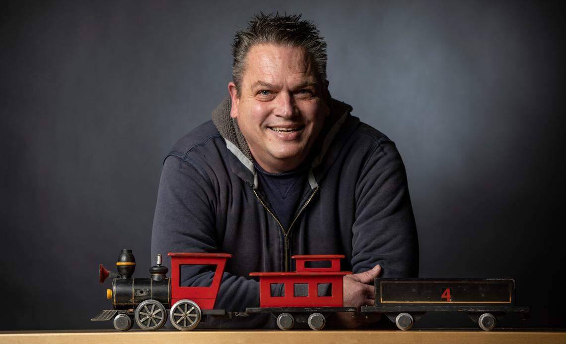 Mark Funk shows off the train that once delivered food to kids at his uncle M. Eugene Torline’s 1970s-era restaurant Casey Jones Junction.