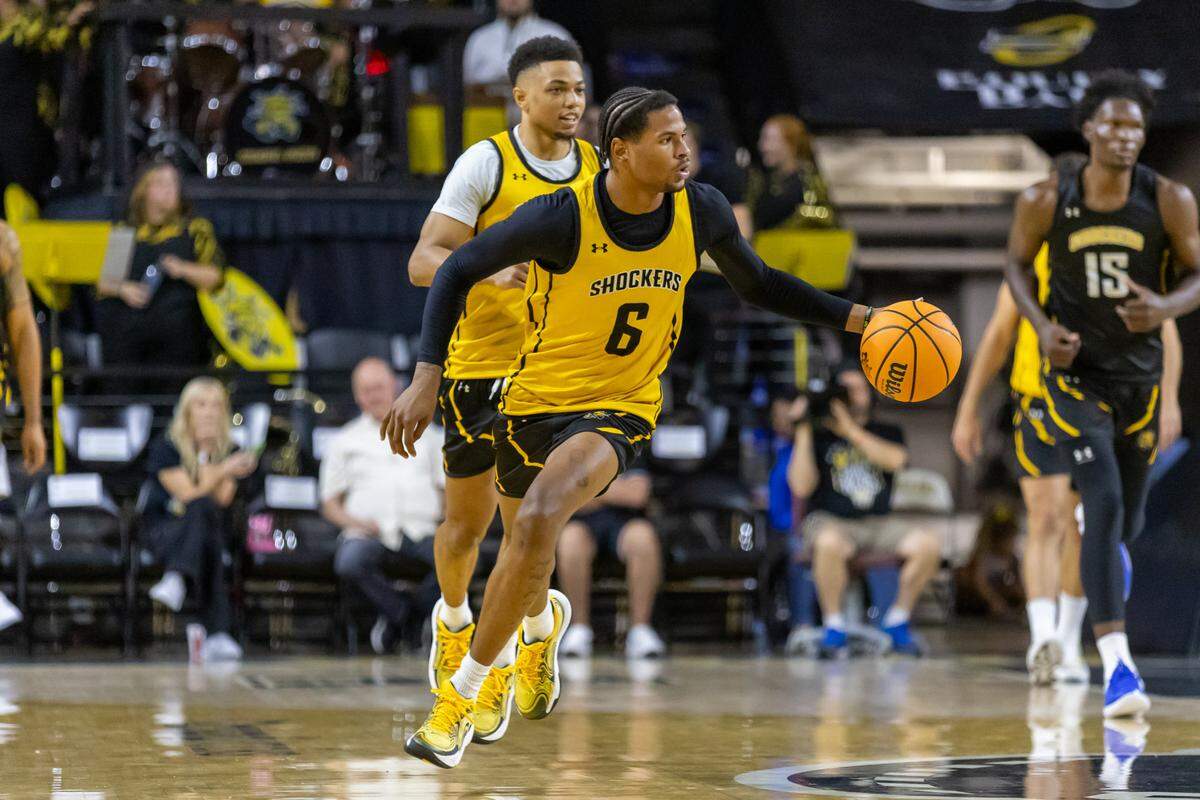 Wichita State junior forward Corey Washington makes a move in transition during Shocker Madness.