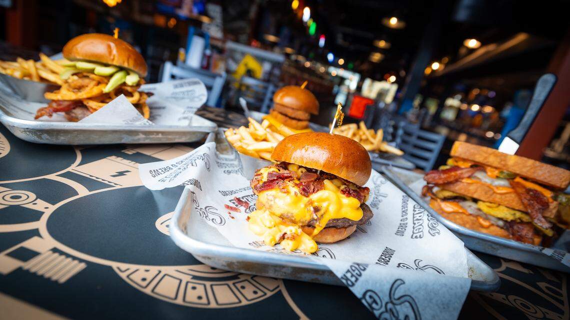 Sickies Garage is known for its menu featuring “50 Burgers, 50 Brews.”