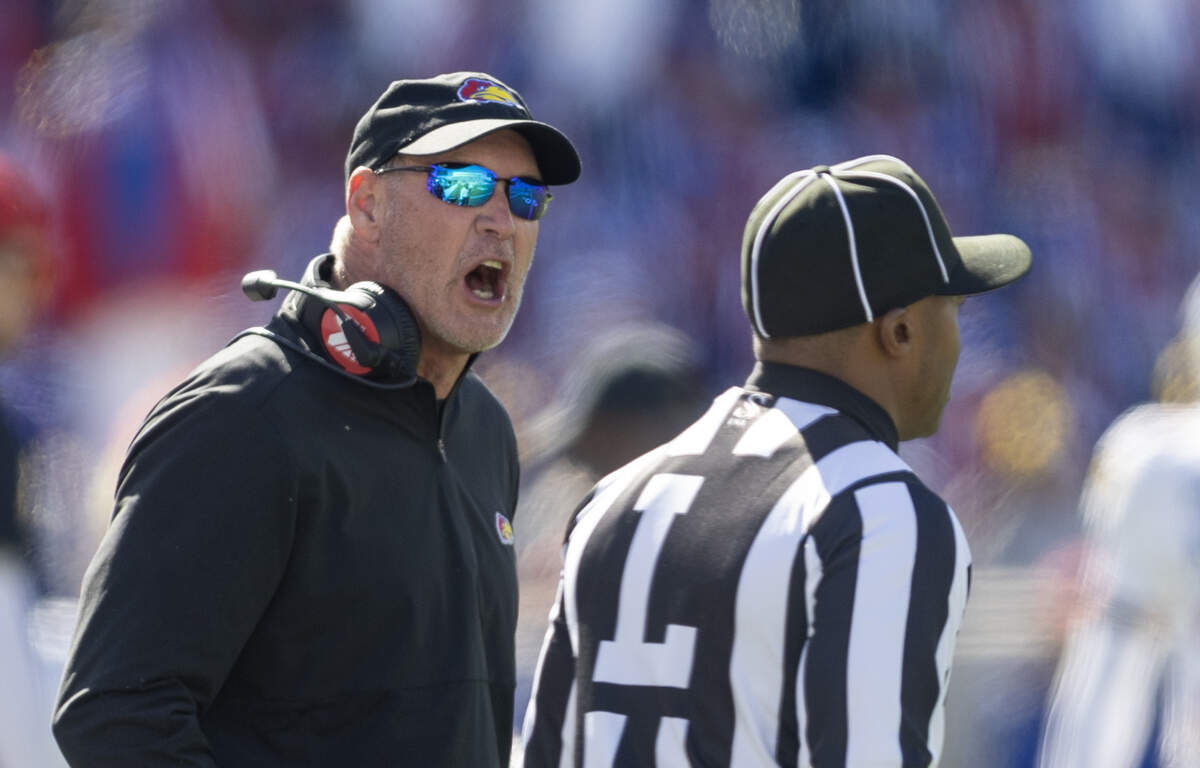 Kansas head coach Lance Leipold yells at the line judge during the first half of their game against Kansas State in Manhattan on Saturday.