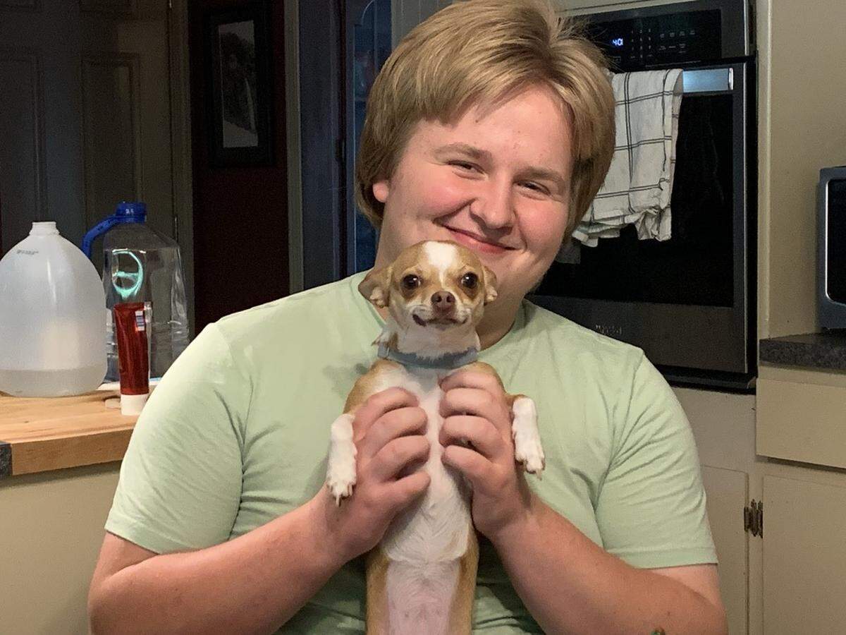 Arlo Eichbauer, when he was 15, with their family dog, Juniper, who was obsessed with Arlo.