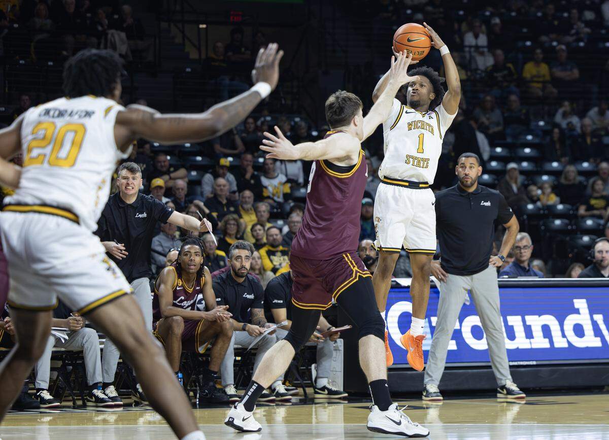 Wichita State’s Kenyon Giles shoots a three pointer during the first half of their game against Loyola at Koch Arena on Thursday.